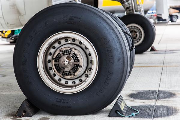 Aircraft wheels and tires are designed to support the full weight of that aircraft while on the ground, and the static and dynamic loads generated during taxi, take-off and landing.